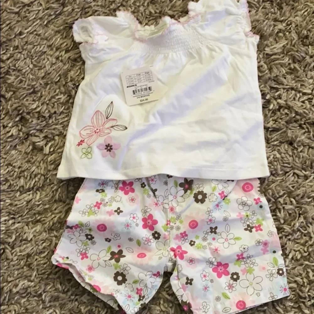 First moments baby girl size 3-6 mons NWT